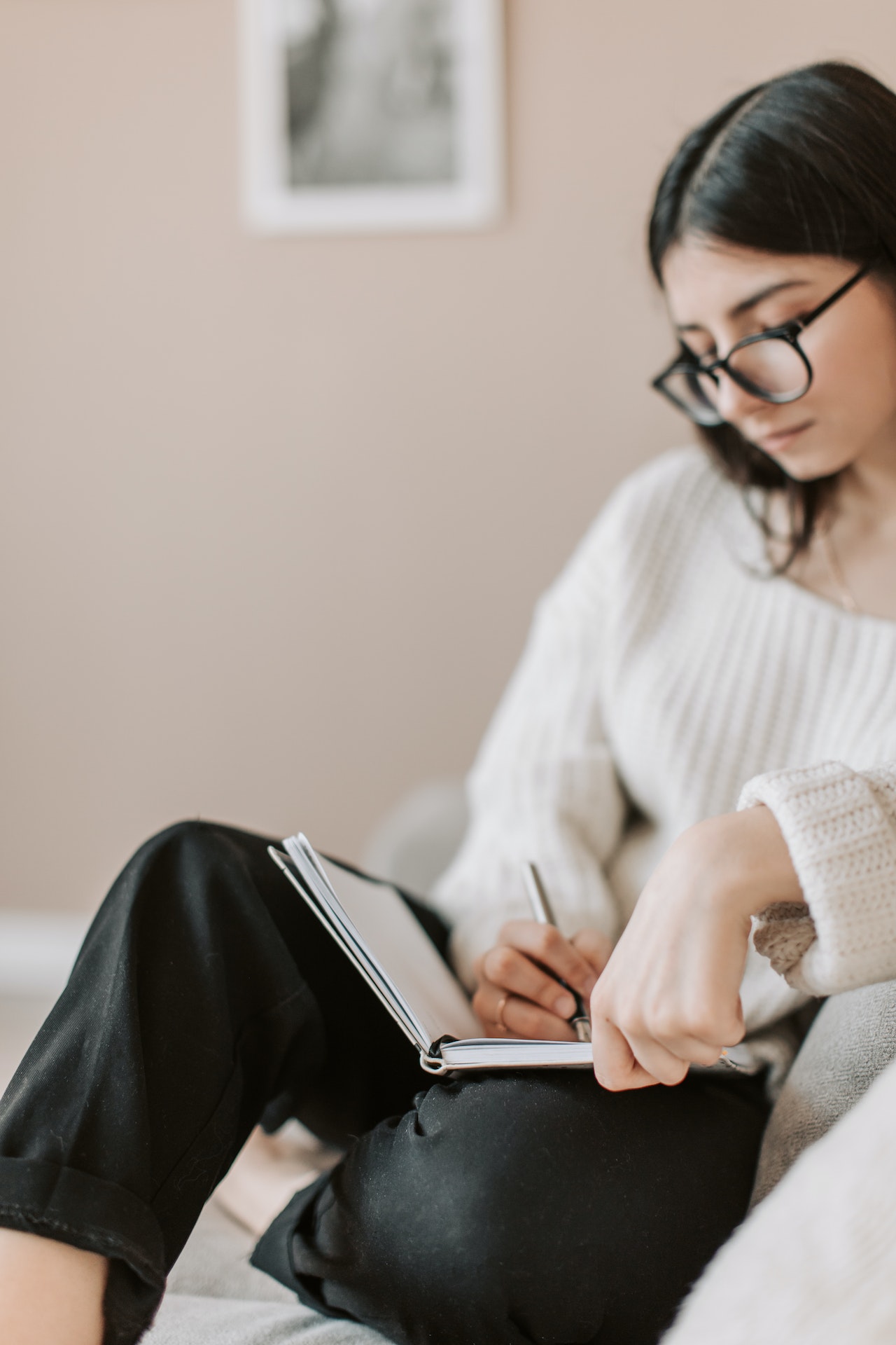 person thanking god and journaling